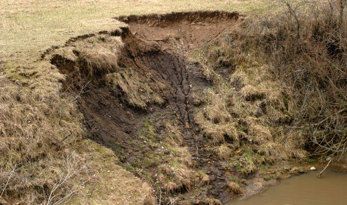 Example of downstream ground erosion.